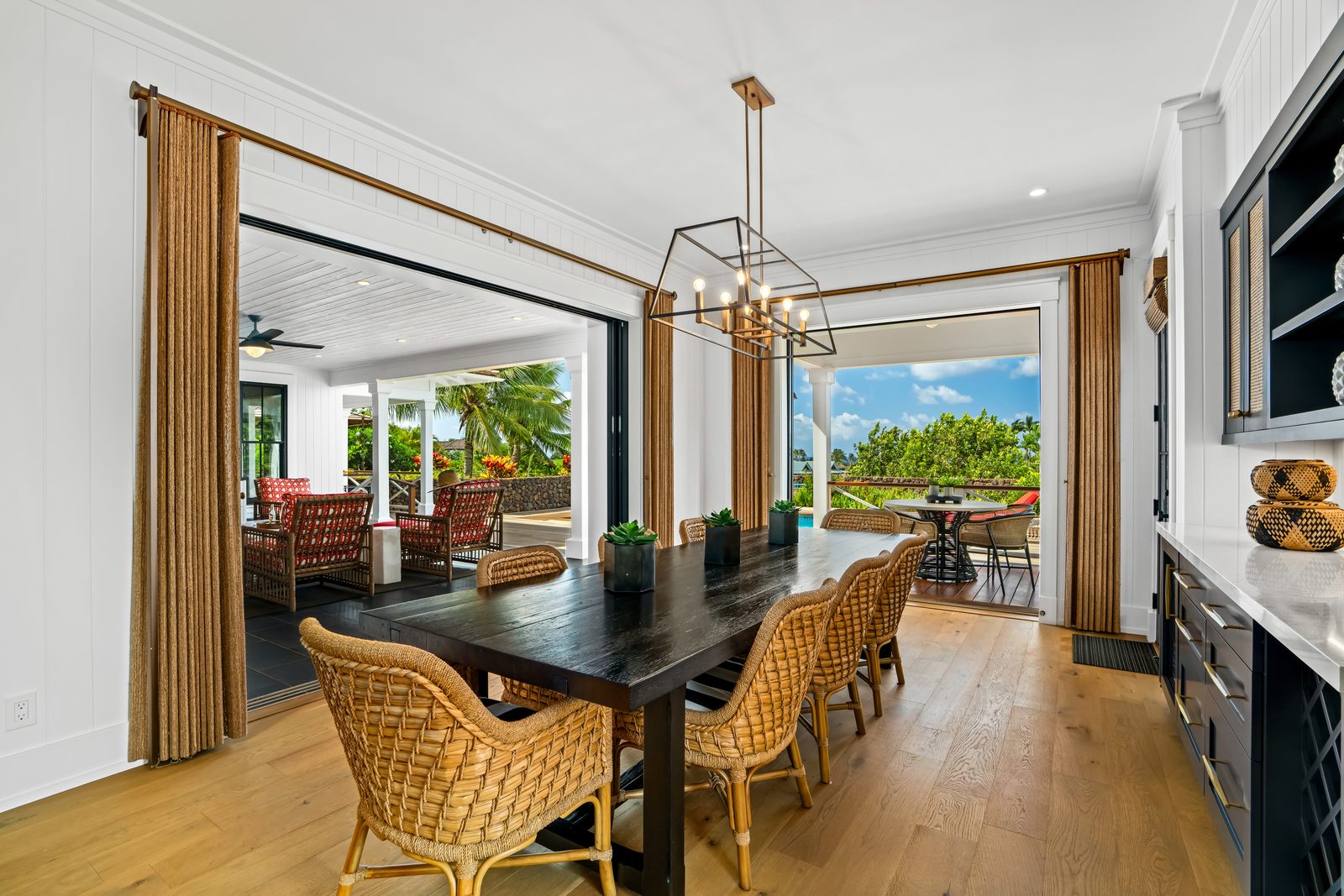 The dining table with the lanai open on both sides
