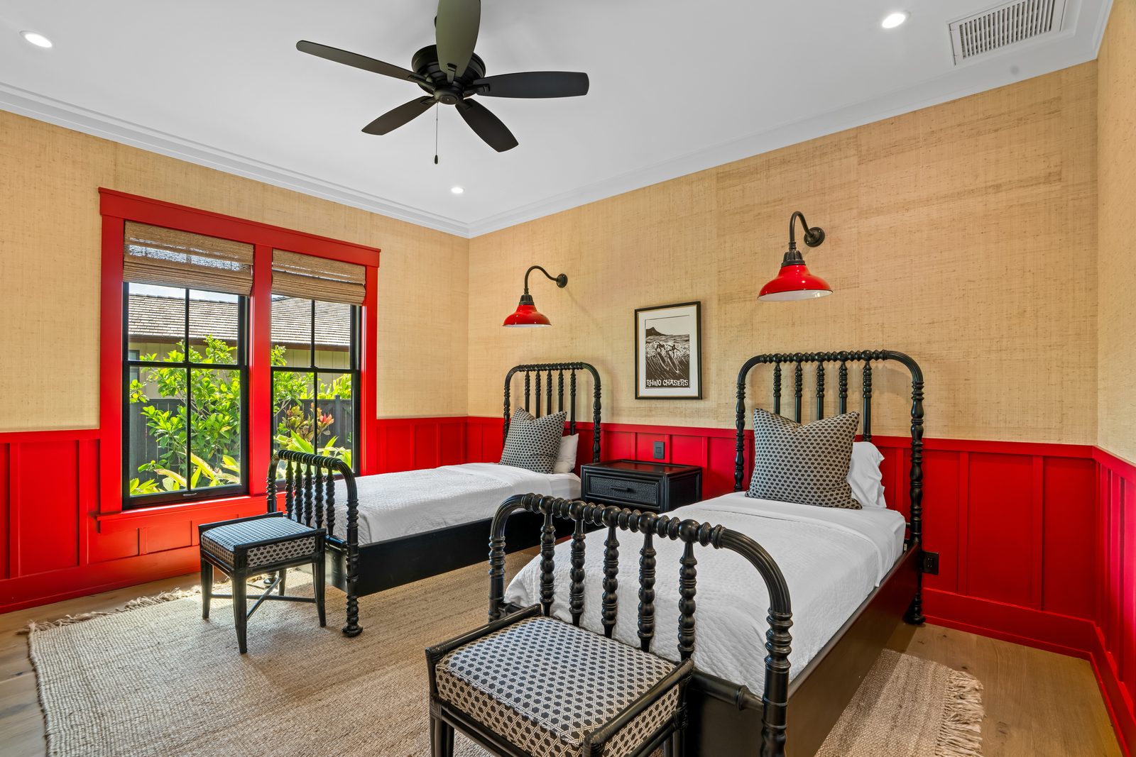 Red Room with two twin beds, red painted wainscot and woven wall covering